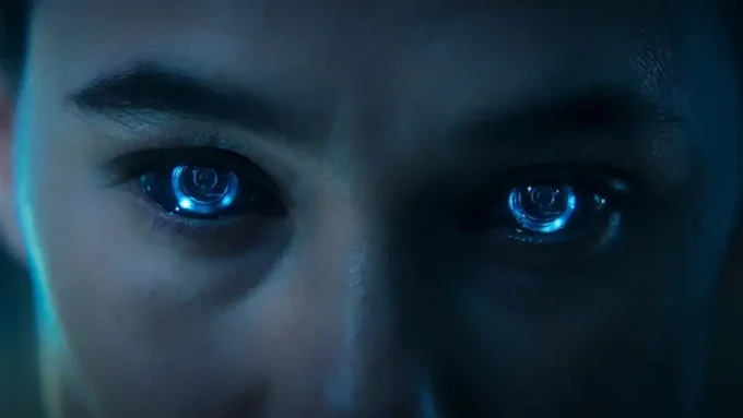 Personagem da série Futuro Deserto da Netflix com os olhos robóticos iluminados de azul (1)